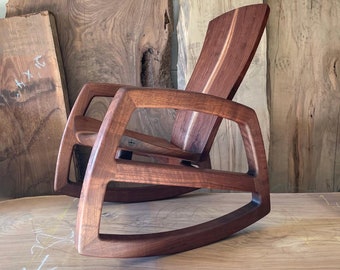 Cascade rocking chair in walnut and white oak.