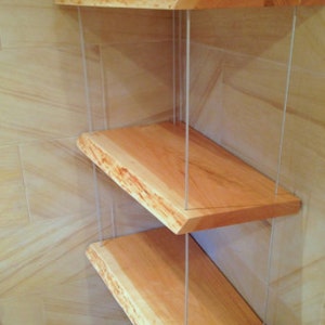 Suspended live edge cherry shelving unit