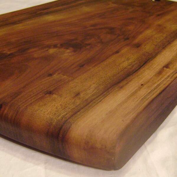 sustainably harvested English walnut cutting and serving board