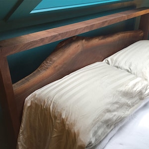 Natural edge walnut bed