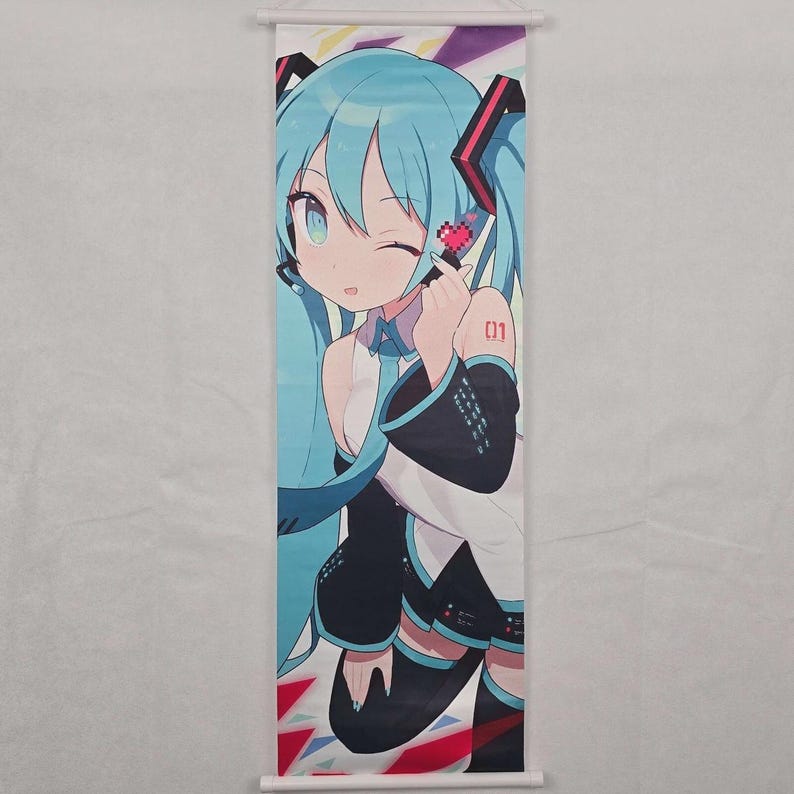 May include: A wall scroll featuring a colorful anime character with long, light blue pigtails and teal eyes. The character is winking and holding a pixelated heart. The scroll has a white background and a wooden rod at the top and bottom.
