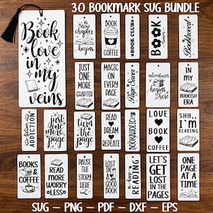 May include: A set of 30 white bookmarks with black text and illustrations. The bookmarks display quotes such as "Book love in my veins," "Magic on every page," and "Let's get lost in the pages." One bookmark has a black tassel.