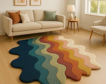 May include: A colorful, wavy area rug in shades of blue, green, yellow, orange, and pink. The rug is placed on a hardwood floor in front of a beige sofa. The rug's design adds a modern touch to the room.