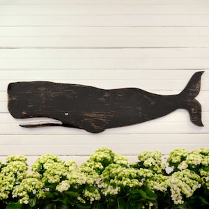 Black Wooden Whale, folk art style. Indoor or outdoor display options. 27 colors to select from.