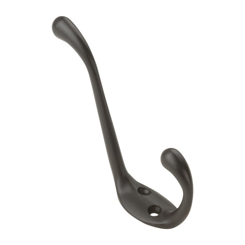 May include: A black metal hook with a curved design. The hook has two small holes near the base.