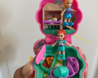 Polly Pocket pink flower