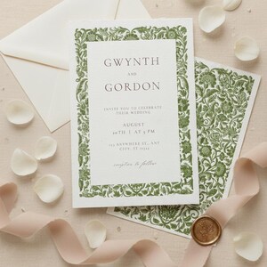 May include: Wedding invitation with a green floral border and the names "Gwynth and Gordon" printed in a serif font. The invitation includes the date, time, and location of the wedding. An envelope, a patterned card, a ribbon, and a wax seal are also visible.