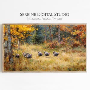 May include: A framed landscape painting featuring a vibrant autumn scene. The artwork depicts a forest with colorful trees and a field of tall grass. Several turkeys are walking through the field. The text "SEREINE DIGITAL STUDIO PREMIUM FRAME TV ART" is at the top.