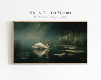 May include: A framed digital art print featuring a serene lake scene. A white swan glides gracefully on the water, surrounded by reeds and mist. The artwork has a vintage aesthetic, with the text "SEREIN DIGITAL STUDIO PREMIUM FRAME TV ART" at the top.
