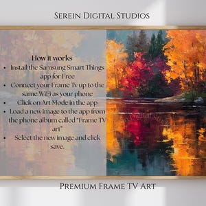 May include: A framed landscape painting with a vibrant autumn scene. The artwork features a lake reflecting colorful trees in shades of red, orange, and yellow. Text on the frame describes how to use the image on a Frame TV.