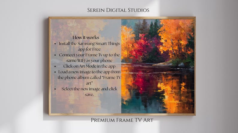 May include: A framed landscape painting with a vibrant autumn scene. The artwork features a lake reflecting colorful trees in shades of red, orange, and yellow. Text on the frame describes how to use the image on a Frame TV.