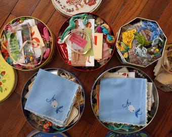 5 vintage tins curated with slow stitching bits junk journal embellishments sewing inspiration boxes
