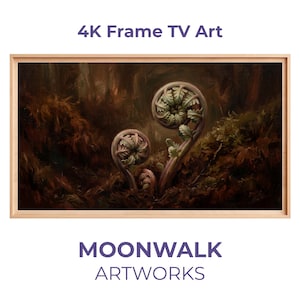 Può includere: Un'opera d'arte incorniciata per una TV 4K Frame. L'immagine presenta un dipinto dettagliato di felci che si aprono in un ambiente forestale, con sfumature di verde, marrone e beige. La cornice è in legno chiaro. Il testo "4K Frame TV Art" e "MOONWALK ARTWORKS" sono visualizzati.