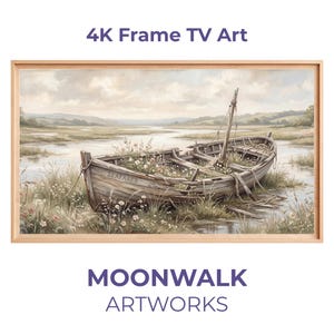 Puede incluir: Pintura de paisaje enmarcada que representa un barco de madera deteriorado, lleno de flores, en un entorno pantanoso. El barco, marcado como "SEAFARER", se encuentra sobre un fondo de cielo nublado y colinas distantes. Se muestra el texto "4K Frame TV Art" y "MOONWALK ARTWORKS".