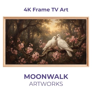 Puede incluir: Una obra de arte enmarcada que presenta una pintura de dos palomas blancas posadas en una rama floreciente. La obra de arte está ambientada en un bosque con iluminación suave. Se muestra el texto "4K Frame TV Art" y "MOONWALK ARTWORKS".