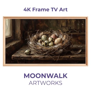 Puede incluir: Una obra de arte enmarcada que presenta un bodegón de un nido de pájaro lleno de huevos moteados y plumas. La obra de arte está ambientada sobre un fondo rústico de madera. Se muestra el texto "4K Frame TV Art" y "MOONWALK ARTWORKS".