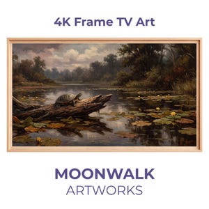 May include: A framed 4K TV art print featuring a serene landscape painting of a pond with a turtle on a log. The artwork includes lily pads and yellow flowers. The frame is light brown, and the text "4K Frame TV Art" and "MOONWALK ARTWORKS" are visible.