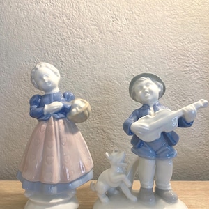 Conjunto de figuras bávaras: niño y niña