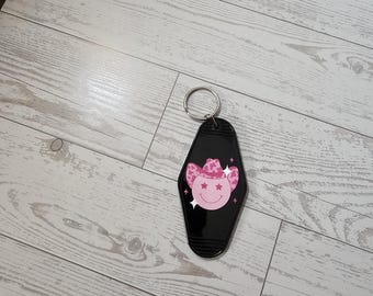 Roze cowgirl-smiley | Motelsleutelhanger | Zwarte sleutelhanger