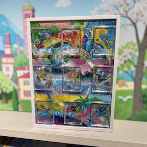 May include: A white framed display case featuring nine colorful illustrations of cartoon characters. Each illustration is encased in a clear acrylic block. The background art depicts a vibrant cityscape and landscape.