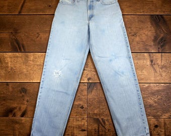 Levi's Vintage 560 Jeans Mens 33x34 Comfort Fit Light Wash Blue Distressed Taper