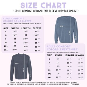 The image is a size chart for an adult comfort colors long sleeve and sweatshirt. It provides measurements for different sizes, including S, M, L, XL, 2XL, and 3XL. The chart includes a section for the width and length of the sleeves, as well as the waist and length of the sweatshirt. The chart is designed to help customers determine the appropriate size for their preferred style of shirt.