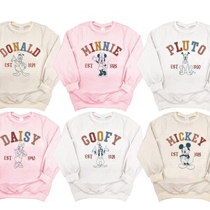 six sweatshirts with mickey mouse on them