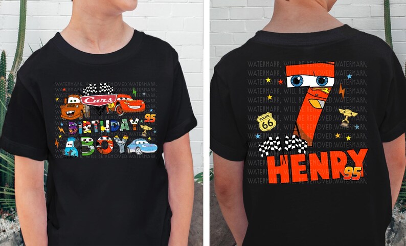 a young boy wearing a black shirt with a cartoon character on it