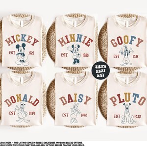 a set of six mickey mouse shirts