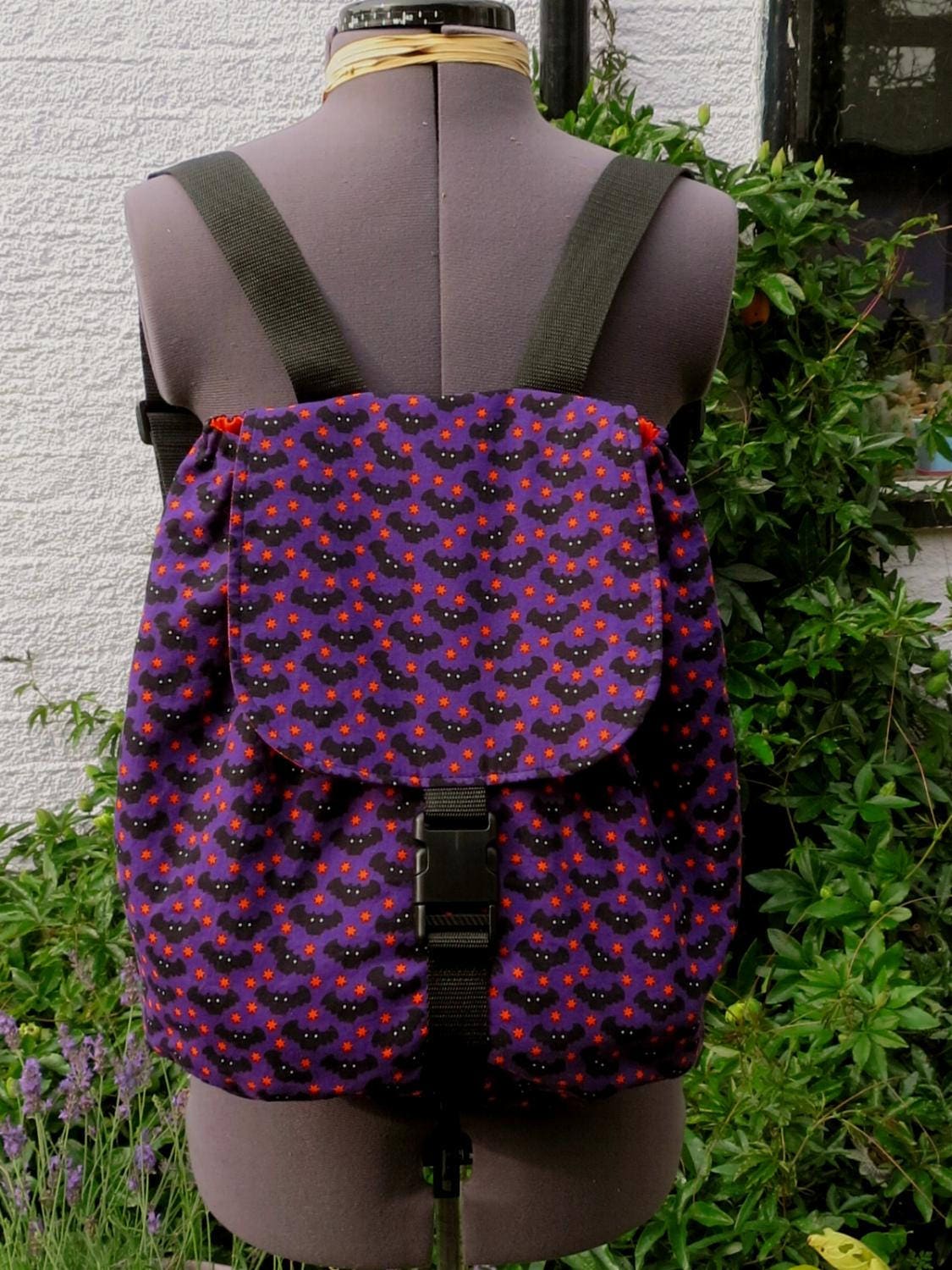 purple bat bag
