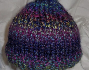 soft handknit hat superchunky in variegated rainbow colours. UK seller