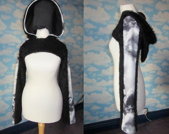 black fluffy shrug with pixie hood and stormy weather clouds detail on the saddle shoulder and hood