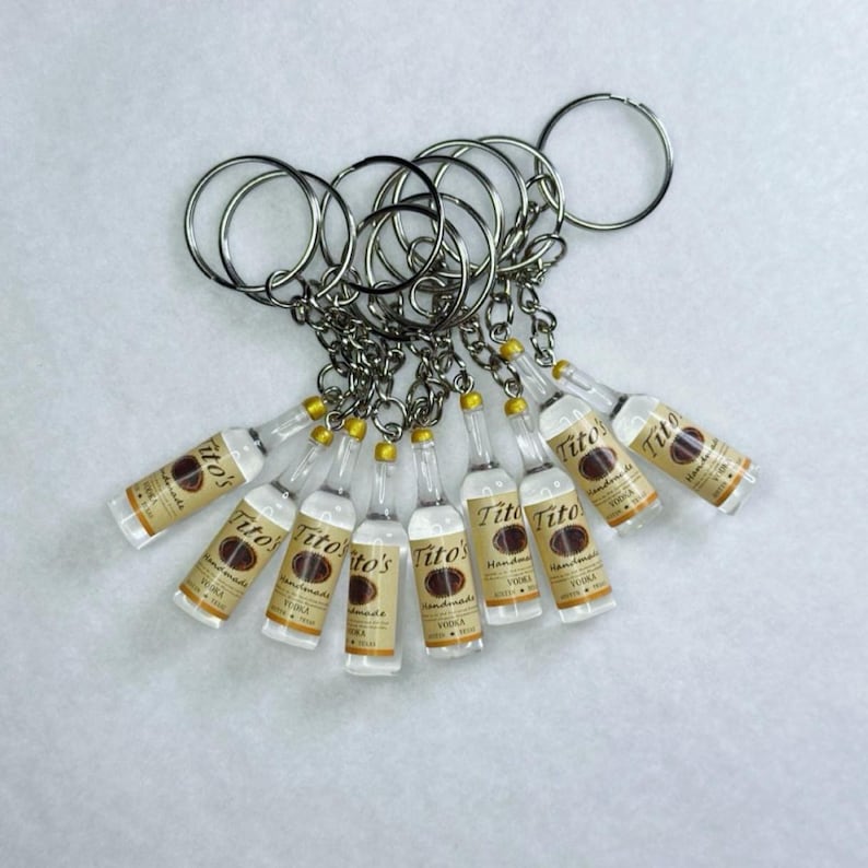 Miniature Vodka Keychain Titos Bottle Replica Resin Charm Detailed Label Metal Keyring Tiny Bottle Design Authentic Look Bartender Gift Cocktail Lover Present Unique Bar Accessory Novelty Item Collector Piece Small Scale Model Realistic