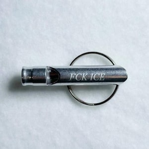 Colorful Aluminum Whistle Keychain Political Statement Accessory Protest Tool Collection Emergency Safety Device Compact Design Everyday Carry Size Metal Ring Attachment Multiple Colors Available Functional Alert System Personal Safety Silver Color