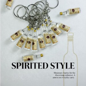 Unique Collectible Keychain Miniature Titos Vodka Bottle Replica Resin Material Detailed Label Design Metal Keyring Attachment Small Scale Model Realistic Look Novelty Gift Item Bartender Appreciation Present Cocktail Enthusiast Accessory