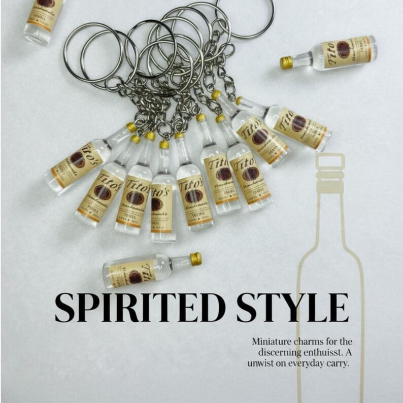 Unique Collectible Keychain Miniature Titos Vodka Bottle Replica Resin Material Detailed Label Design Metal Keyring Attachment Small Scale Model Realistic Look Novelty Gift Item Bartender Appreciation Present Cocktail Enthusiast Accessory