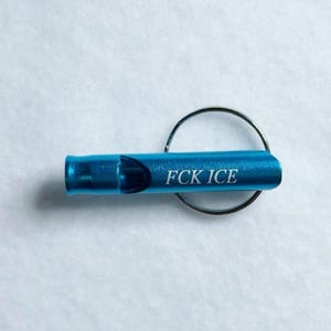 Everyday Carry Whistle Keychain Aluminum Construction Political Statement Tool Protest Accessory Compact Design Multiple Colors Available Emergency Signal Device Safety Equipment Collection Metal Ring Attachment Functional Alert System Blue Color