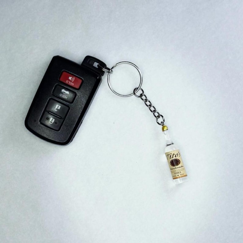 Titos Vodka Miniature Keychain Bottle Replica Gift Bartender Appreciation Present Cocktail Enthusiast Collection Resin Charm Detailed Design Metal Keyring Tiny Size Realistic Look Novelty Accessory Unique Present Idea Fun Conversation
