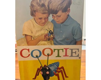 Spelet Cootie Bygg en Cootie-bugg Vintage Schaper-byggspel från 1940-talet