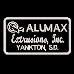 May include: White embroidered patch with the text "ALUMAX Extrusions, Inc. YANKTON, SD."