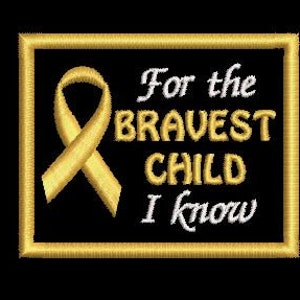 May include: Gold embroidered patch with a yellow ribbon and the text "For the bravest child I know".