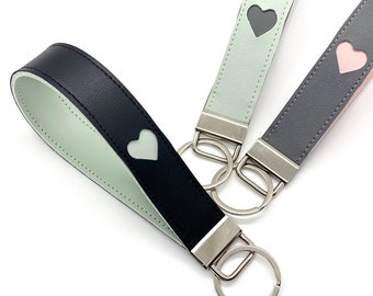 keychain wristlet heart embossed key lanyard faux leather. dozens of colors pastels bolds. NEW style INTRODUCTORY price.