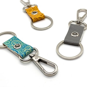 keychain clip and key ring. purse accessory zipper pull. faux leather silver finish