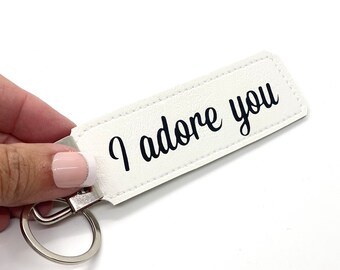 personalized keychain name or saying option to add three of your images your memories. faux leather keychain.