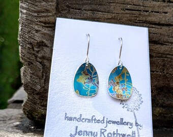 Blue and yellow hand printed and painted wildflower anodised aluminium earrings with sterling silver ear wires