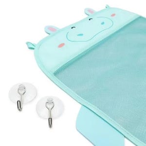 May include: A light blue mesh bath toy organizer shaped like a hippo, with two suction cup hooks. The hippo has pink accents on the ears and cheeks, and a smiling face. The organizer is designed to hang on a wall.