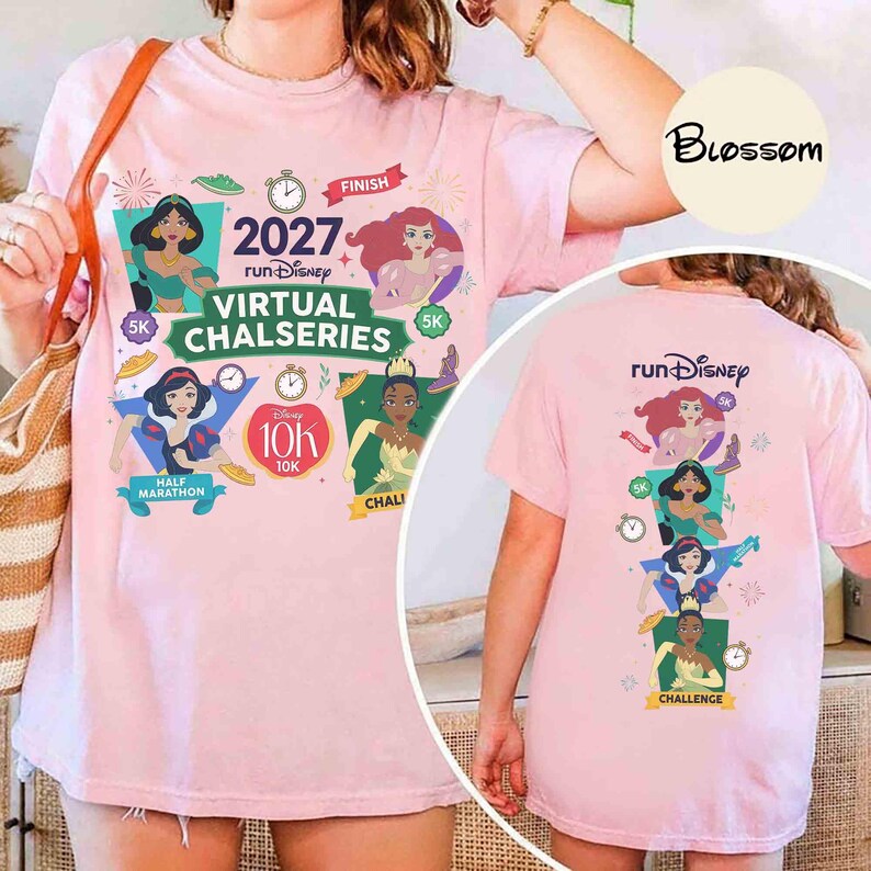 May include: A light pink t-shirt featuring Disney princess graphics and the text 2027 runDisney VIRTUAL CHALSERIES. The front displays four princesses in geometric shapes with race distances, while the back shows a vertical stack of the same characters.