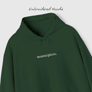 Broderad 'Masterpiece' Gildan mysig unisex-hoodie