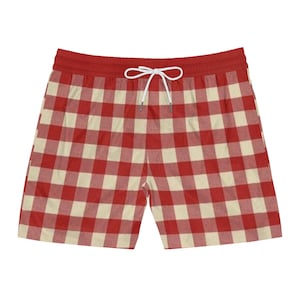 Puede incluir: Pantalones cortos a cuadros rojos y crema con cintura roja y cordón blanco. Los pantalones cortos presentan un patrón de cuadros clásico. Fabricados con un material suave y cómodo, ideal para uso casual.