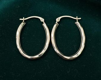Aros ovalados trenzados de 0,90" de oro amarillo macizo de 10 quilates